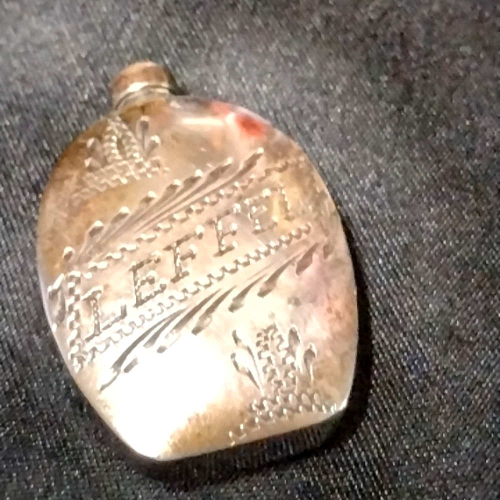 Mini sterling silver perfume bottle